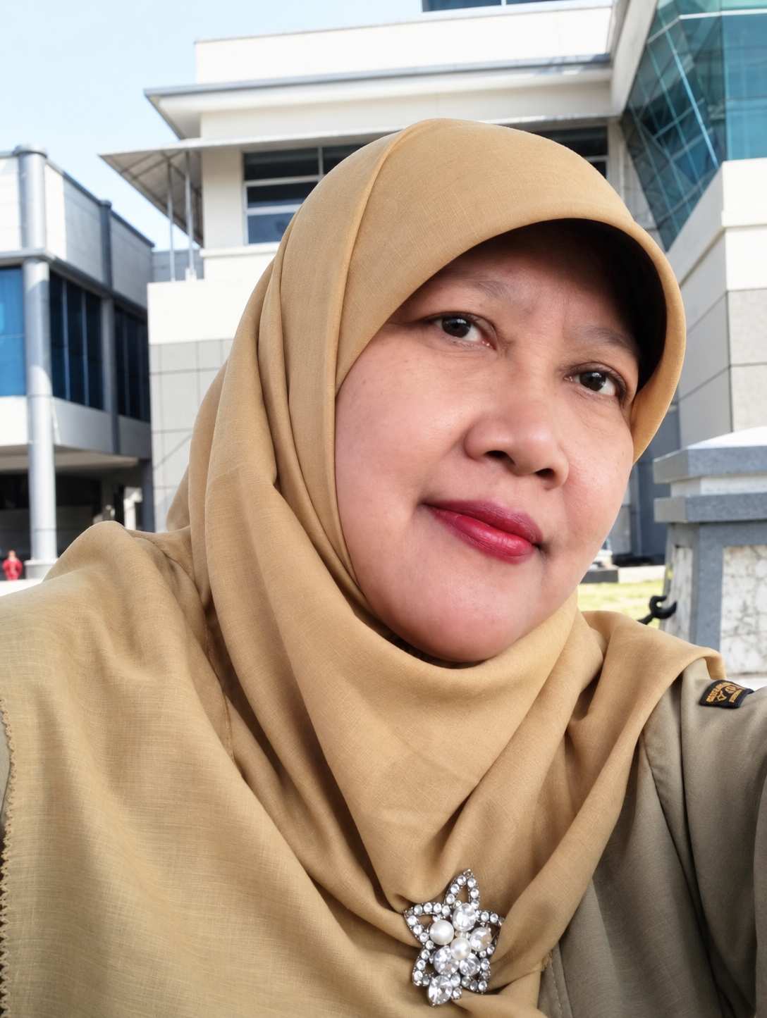Dra. Rahmi Wilandari, M.Pd.